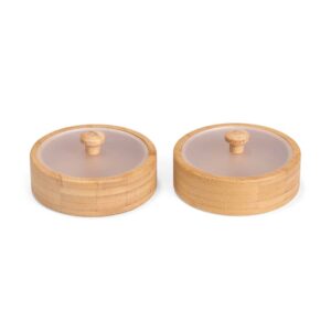 Dois potes de bambu com tampas transparentes vistos de frente